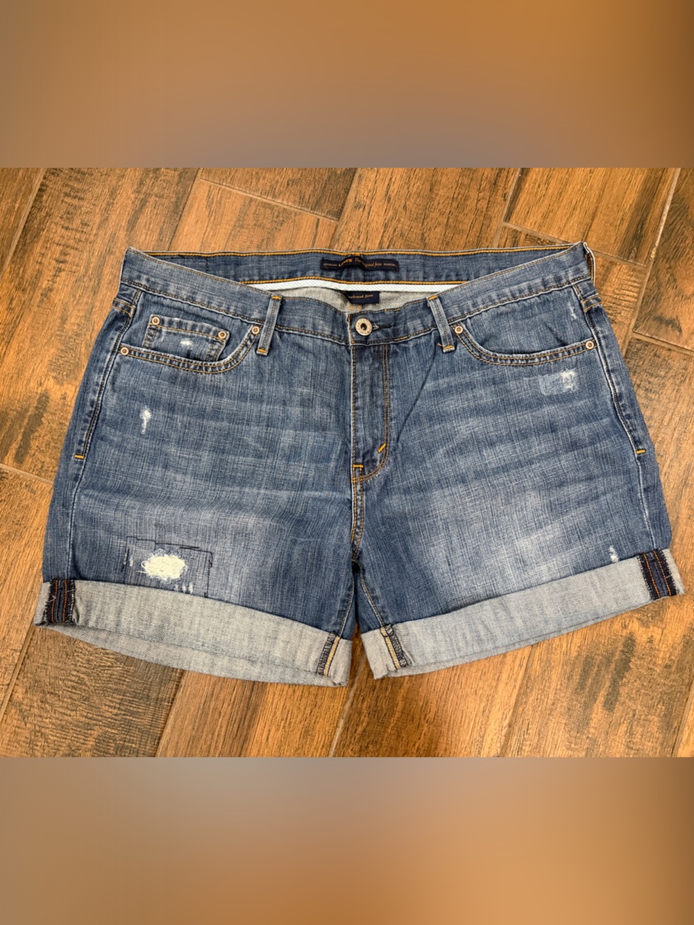 Levi's Medium Blue Distressed Rolled-Hem Jean Shorts